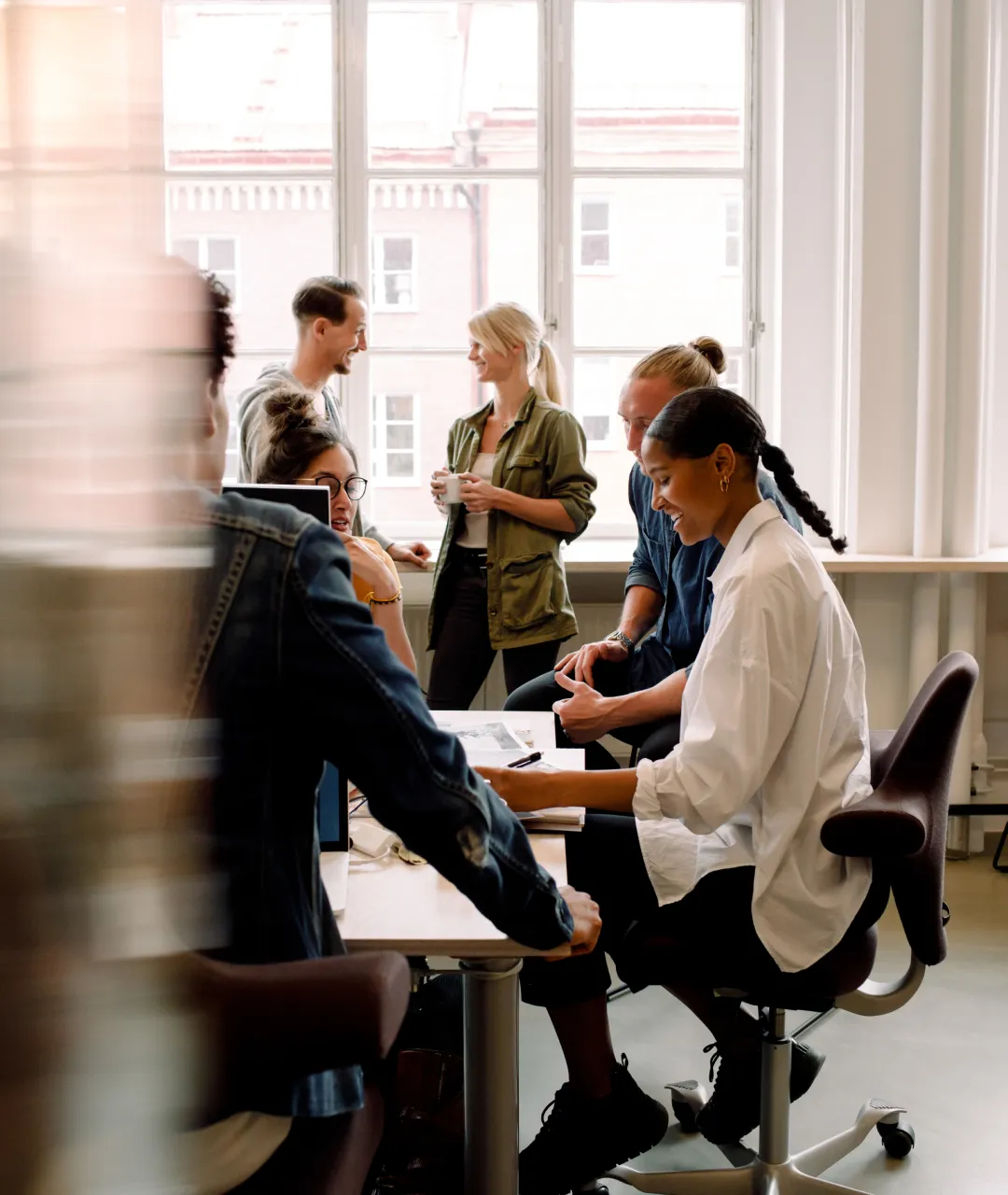 Colleagues working together at table